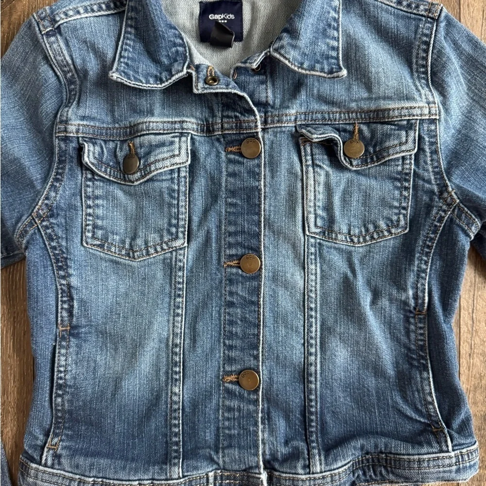 Gap Kids Jean Jacket.  Girl’s size XL.  Snap button closures.